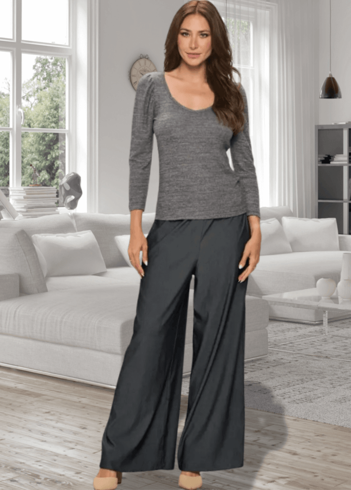 Experience the perfect blend of comfort and style with the Celine 3/4 Puff Sleeve V-Neck sweater in Mocha Gray. Crafted from a soft rayon-spandex blend, this fitted sweater offers a cashmere-like softness that feels luxurious against the skin. Its flattering v-neck and trendy puff sleeves add a feminine touch, while easy machine wash care keeps it practical | Renee C Style