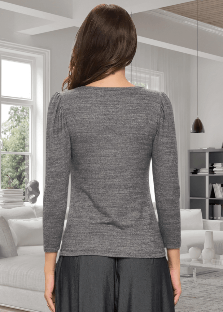 Experience the perfect blend of comfort and style with the Celine 3/4 Puff Sleeve V-Neck sweater in Mocha Gray. Crafted from a soft rayon-spandex blend, this fitted sweater offers a cashmere-like softness that feels luxurious against the skin. Its flattering v-neck and trendy puff sleeves add a feminine touch, while easy machine wash care keeps it practical | Renee C Style