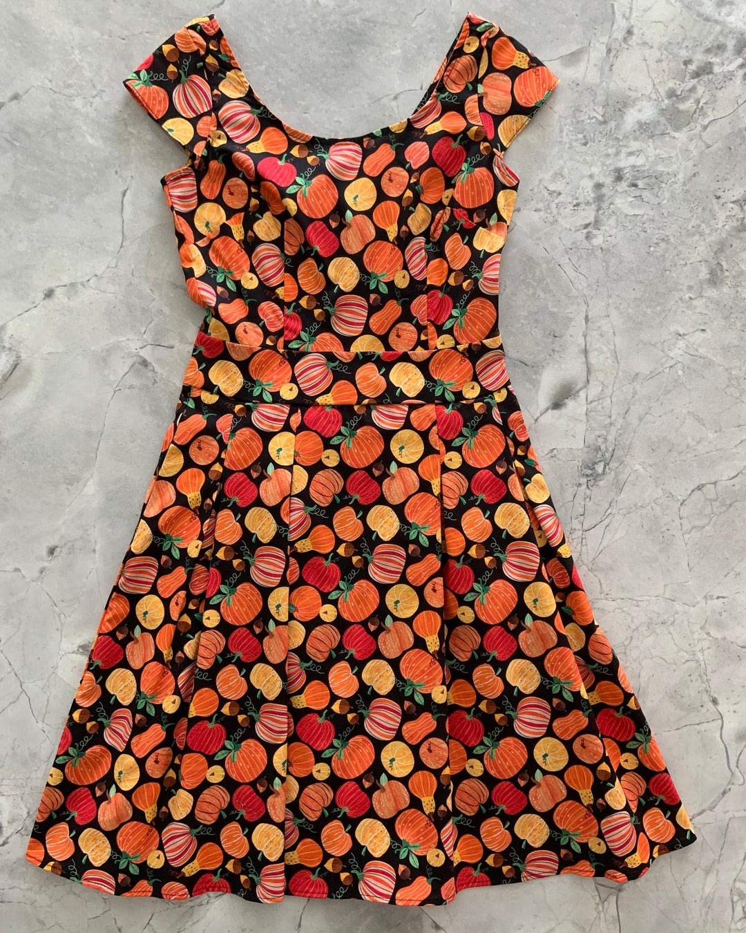 Made in USA. Shop the Gourdgeous Margaret cotton dress by Retrolicious, with cap sleeves, inverted pleats, an A-line skirt and pockets. Size up. So cute for Fall.