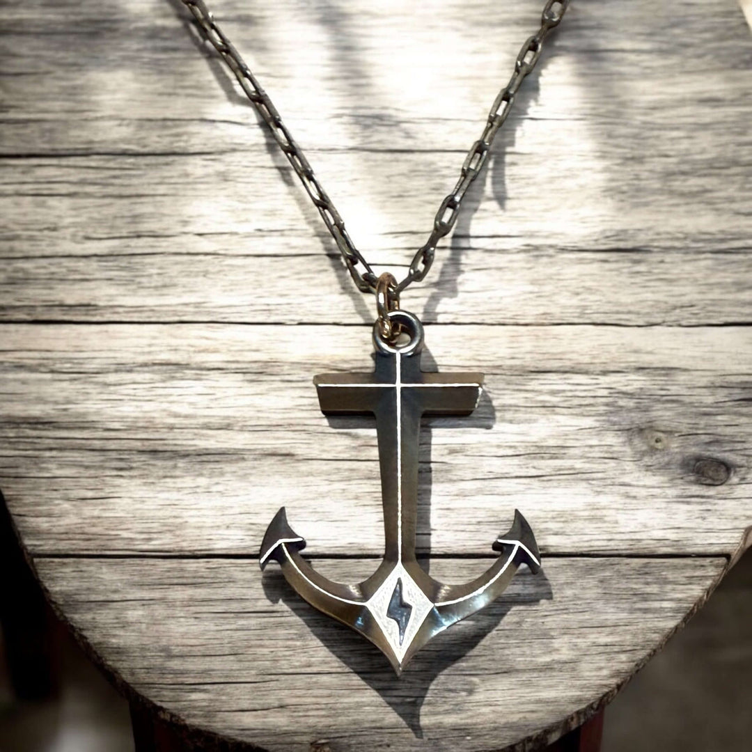 Handcrafted solid bronze anchor necklace on an antique bronze chain. Unisex. Custom lengths available. Made in USA with a lifetime warranty.