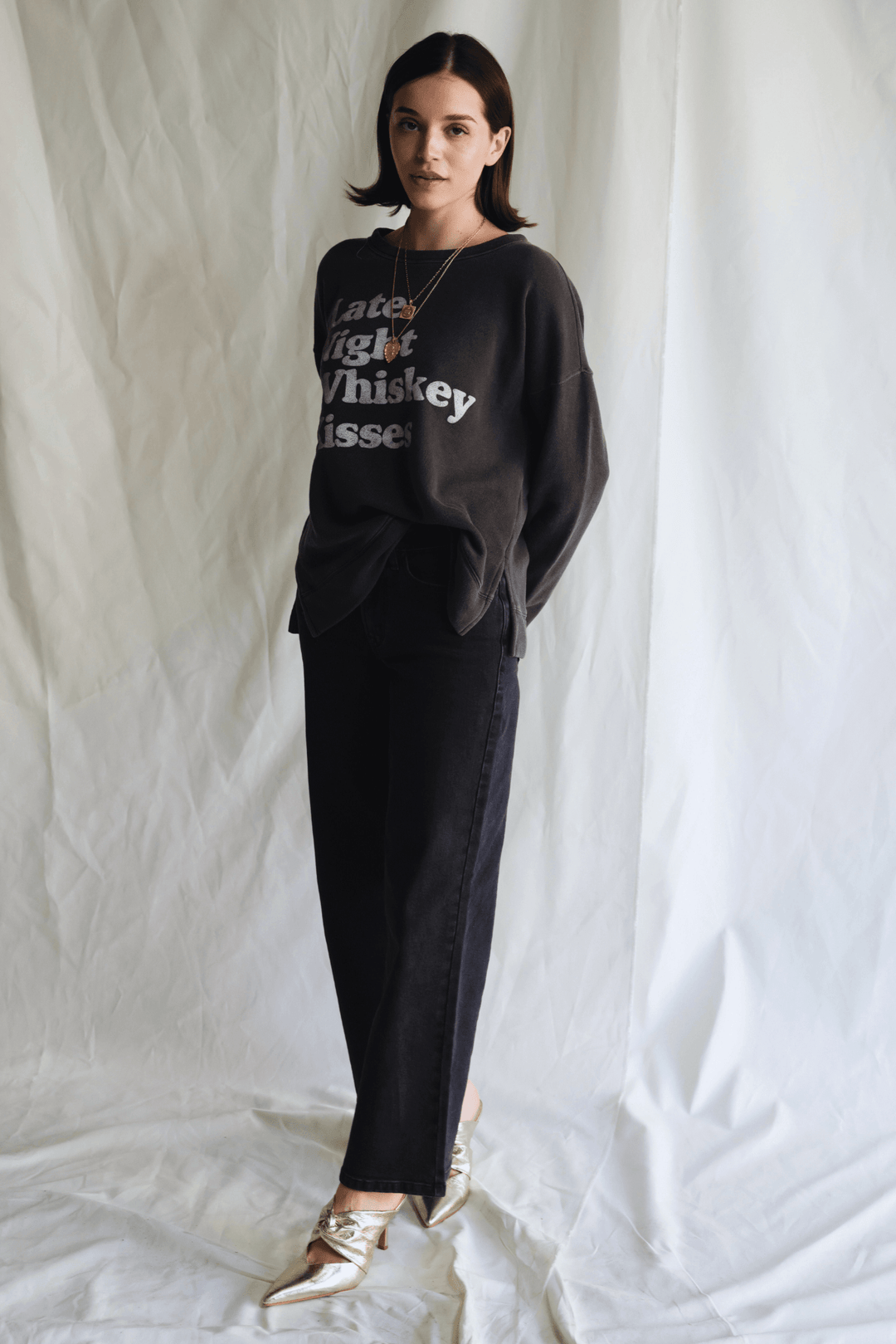 Whiskey Kisses Sweatshirt by People of Leisure — vintage-inspired graphic crewneck in Vintage Black. Ethically made in LA. Sizes XS–XL.