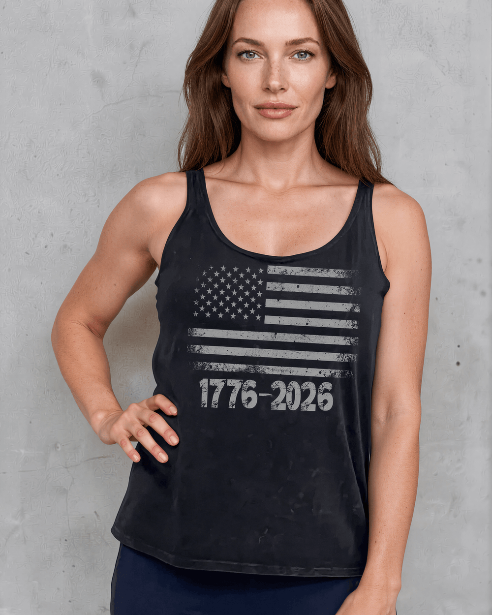 1776-2026 Distressed American Flag Tank — Made in USA with USA Grown Cotton. Tonal mineral-washed black, soft 95% cotton, relaxed fit. Perfect for 4th of July.