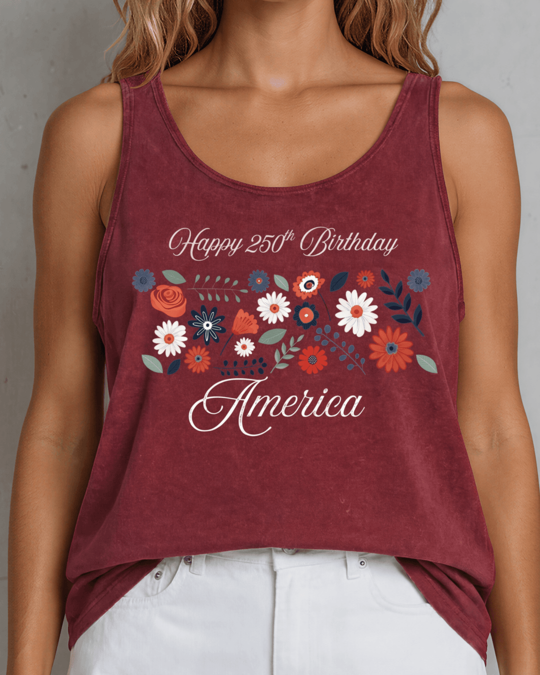 Celebrate July 4th in a USA-made, USA cotton-grown floral graphic tank top. Burnt Red Clay mineral wash, relaxed fit, soft & stretchy. Proudly made in America.