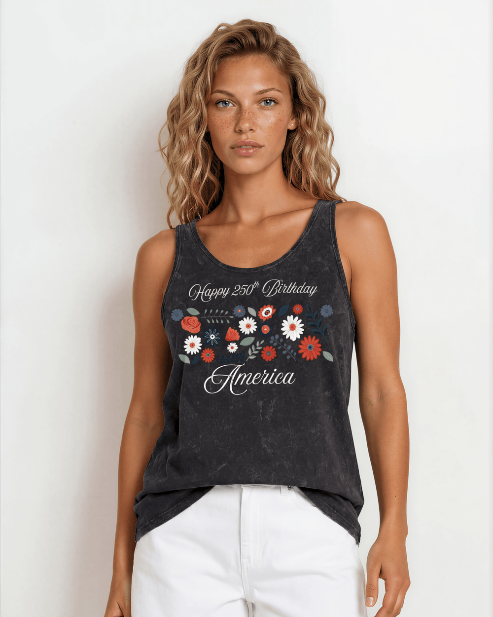 Celebrate July 4th in a USA-made, USA cotton-grown floral graphic tank top. Black mineral wash, relaxed fit, soft & stretchy. Proudly made in America.