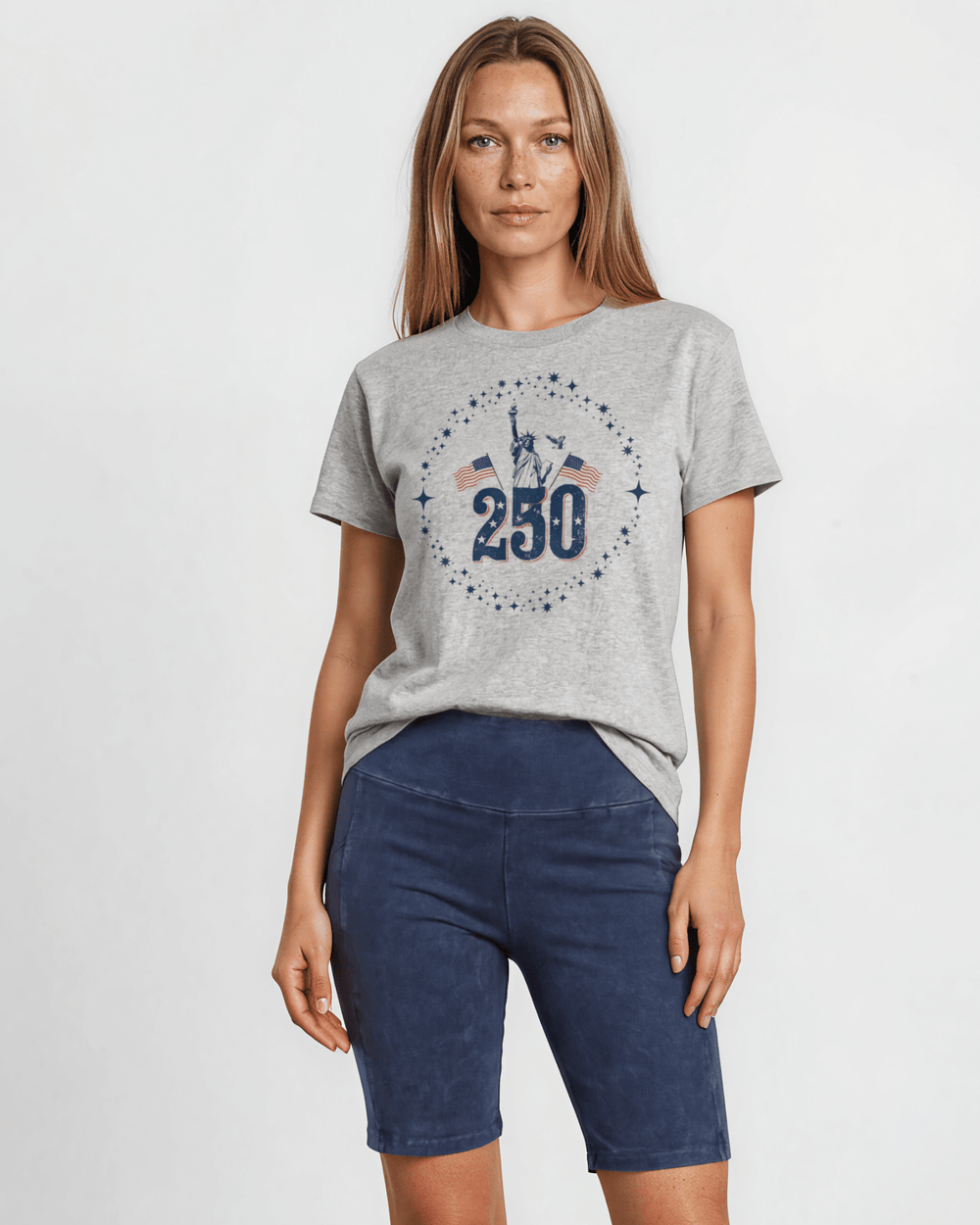 250 Statue of Liberty Patriotic Graphic Tee — Made in USA. Lady Liberty & American flags on heather gray, 100% cotton, relaxed fit. Perfect for 4th of July.