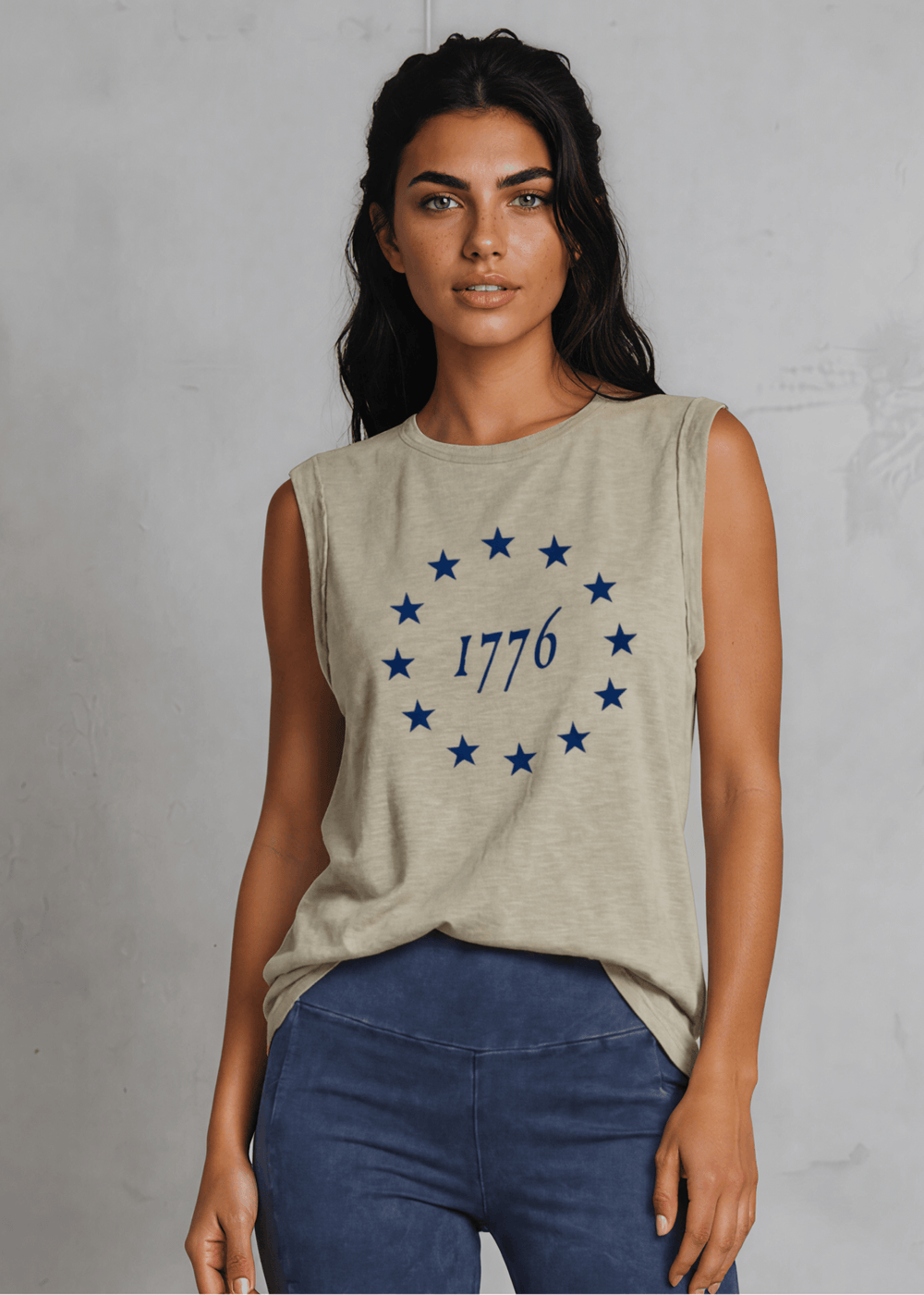 1776 Betsy Ross 13 Stars Graphic Muscle Tee — Made in USA. Light olive, relaxed fit, 75% cotton. Sleeveless patriotic top perfect for 4th of July. Sizes S-L.