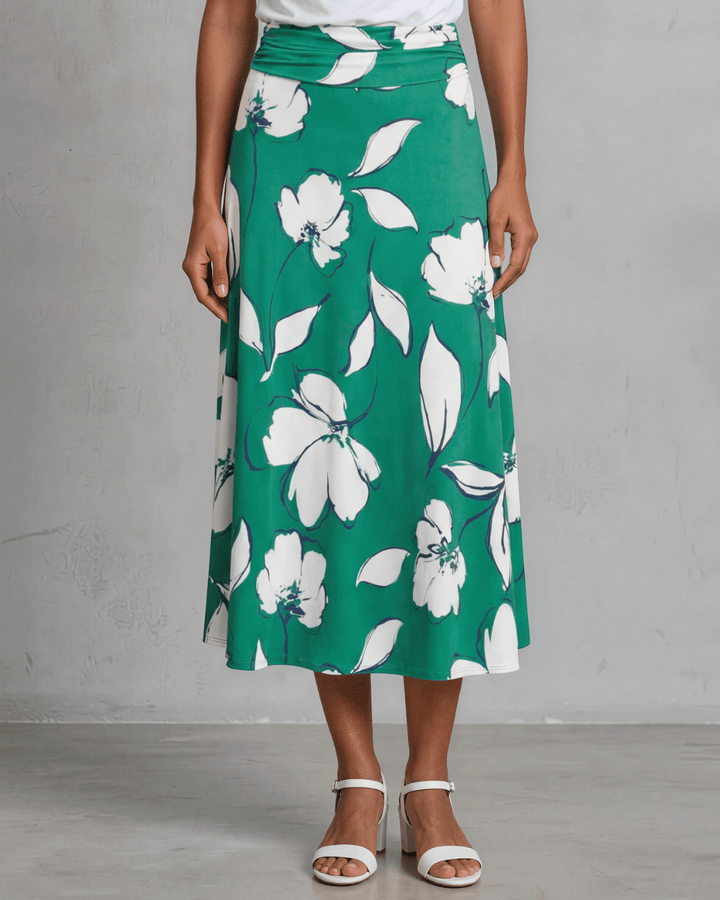 Shop the Marie Floral Maxi Skirt in bold green &amp; white. A-line silhouette, ruched waistband, sizes S-L. 95% Poly/5% Spandex. Made in USA.