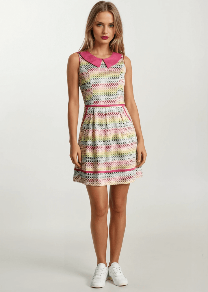 Mod Style Made in USA Dress, Fun and totally functional, this retro dress is bound to be your new favorite! Shown in our Rainbow Drop print, this 60s style cotton dress features a contrast Peter Pan collar, contrast piping throughout, a-line skirt with side pockets, and a back zippered closure.
