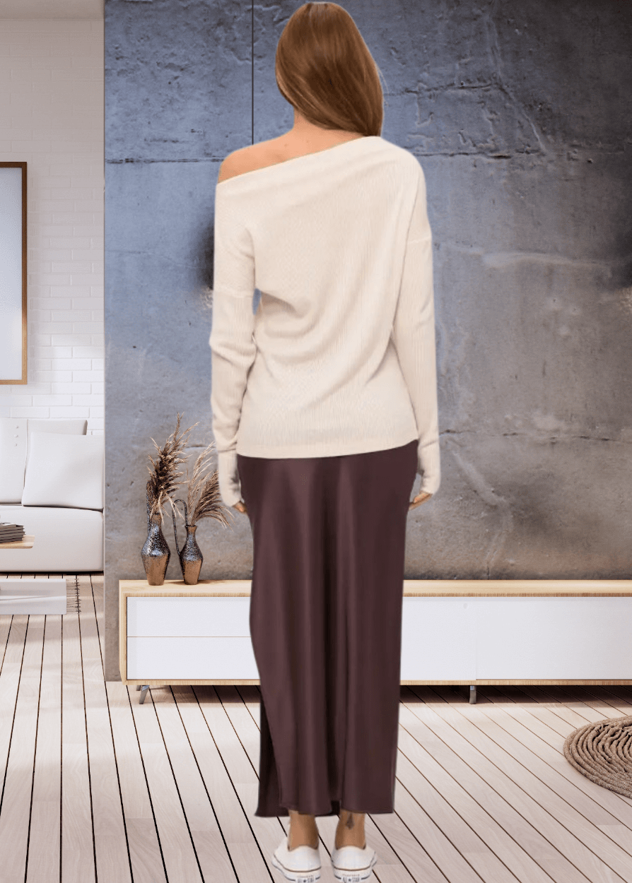 Experience ultimate comfort with the Grace Ribbed Knit Thumbhole Sweater, crafted in the USA from super soft rayon and spandex blend. Its relaxed dolman fit and boat neck create effortless style | Renee C Style