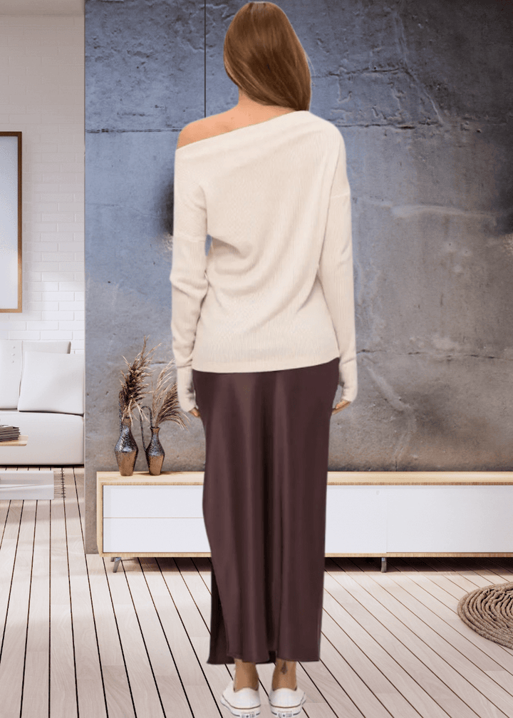 Experience ultimate comfort with the Grace Ribbed Knit Thumbhole Sweater, crafted in the USA from super soft rayon and spandex blend. Its relaxed dolman fit and boat neck create effortless style | Renee C Style