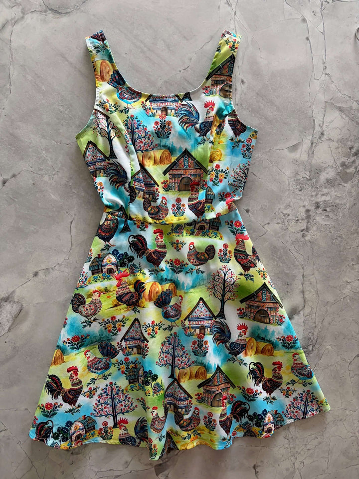Shop the Farm Skater Dress by Retrolicious — vintage-style A-line, farm print, pockets, stretch cotton. Made in USA. Sizes XS–4X.