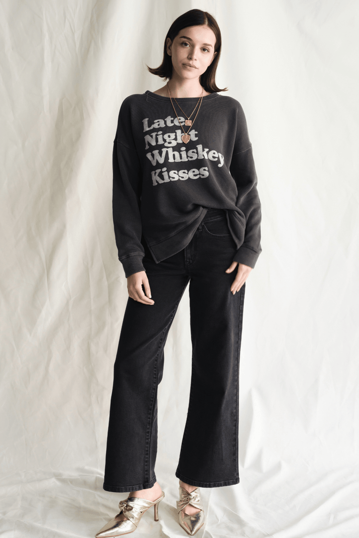 Whiskey Kisses Sweatshirt by People of Leisure — vintage-inspired graphic crewneck in Vintage Black. Ethically made in LA. Sizes XS–XL.