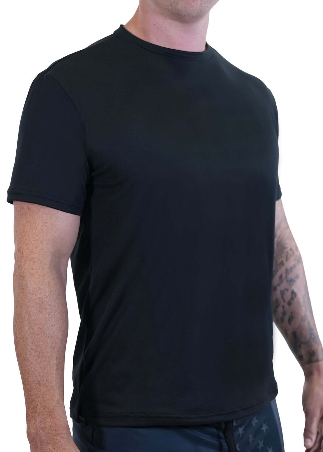 Experience unmatched comfort and performance with the SoftTECH™ Athletic Cut Tee. Crafted from super soft SoftTECH™ fabric, this lightweight short sleeve tee features a side notch for a better fit, making it ideal for all your spring activities. Designed for an athletic silhouette, it moves with you while keeping you comfortable all day long. Proudly made in the USA since 1990, this essential tee combines quality and style effortlessly. Elevate your everyday wardrobe with a shirt that delivers softness, dur
