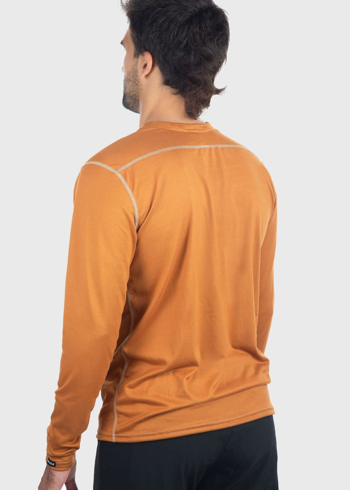 Experience comfort and protection with the Essential SoftTECH™ Shirt. This lightweight long sleeve tee features a relaxed fit, back yoke, and flat seams designed to keep you comfortable all day. Built-in UPF 50 offers reliable sun protection, making it perfect for any spring activity. Available in multiple colors and proudly made in the USA since 1990, this shirt is a versatile wardrobe essential you&