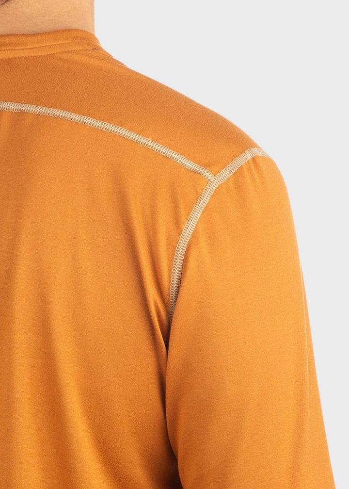 Experience comfort and protection with the Essential SoftTECH™ Shirt. This lightweight long sleeve tee features a relaxed fit, back yoke, and flat seams designed to keep you comfortable all day. Built-in UPF 50 offers reliable sun protection, making it perfect for any spring activity. Available in multiple colors and proudly made in the USA since 1990, this shirt is a versatile wardrobe essential you&