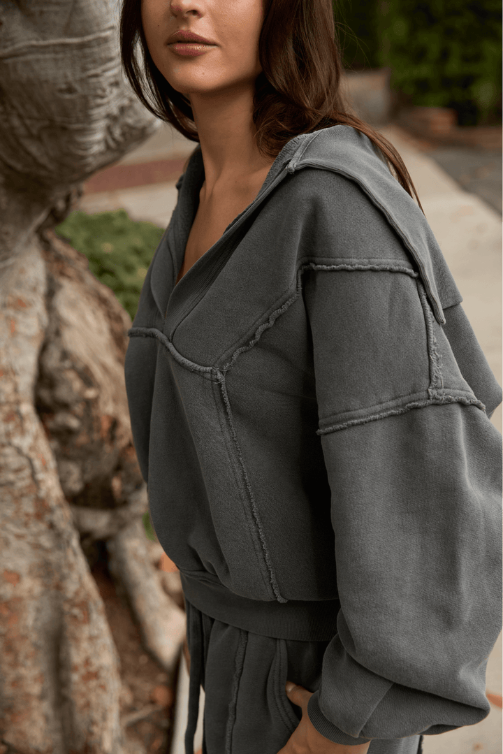  Ryanne Sweatshirt by People of Leisure — 100% organic cotton, deep V-neck, raw edges in Camel &amp; Vintage Black. Made in LA. Sizes XS–XL
