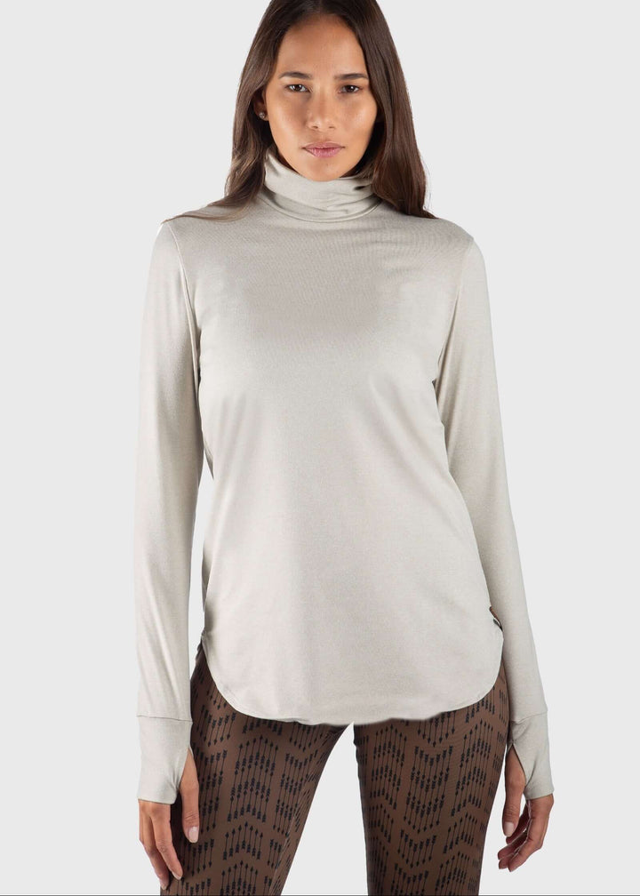 Experience unmatched warmth and comfort with the SoftTECH™ HEATR® Tunic by WSI Sportswear. Designed in the USA as a relaxed-fit base layer, it keeps you cozy in temperatures ranging from 0° to 75°F