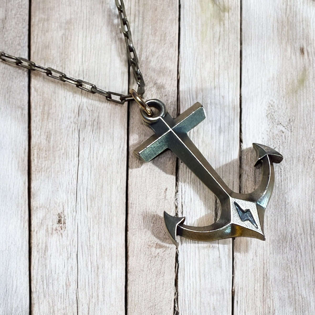 Handcrafted solid bronze anchor necklace on an antique bronze chain. Unisex. Custom lengths available. Made in USA with a lifetime warranty.