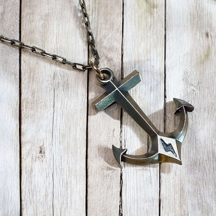 Handcrafted solid bronze anchor necklace on an antique bronze chain. Unisex. Custom lengths available. Made in USA with a lifetime warranty.