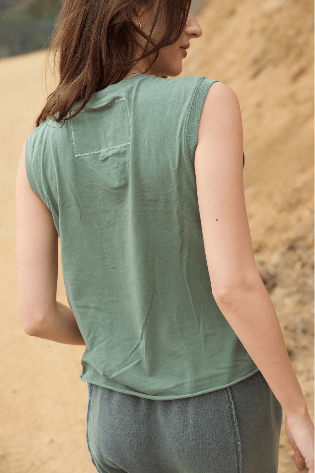 Ana Tank by People of Leisure — 100% organic cotton, relaxed fit, sleeveless in 6 colors. Ethically made in LA. Sizes XS–XL.