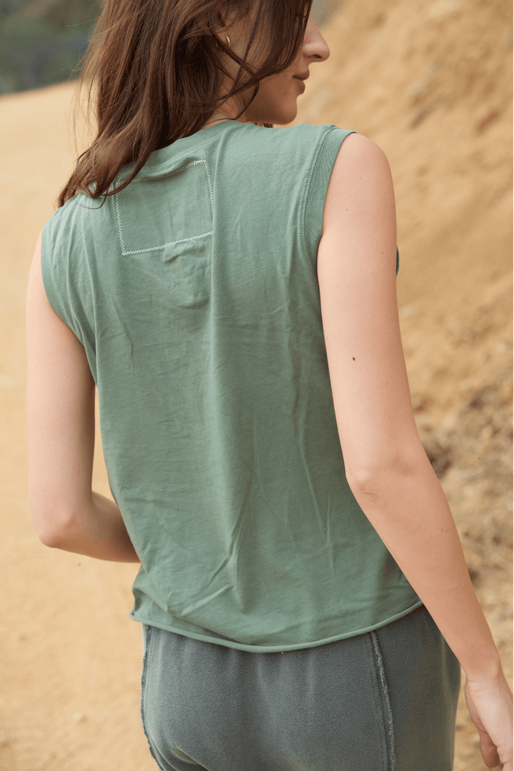 Ana Tank by People of Leisure — 100% organic cotton, relaxed fit, sleeveless in 6 colors. Ethically made in LA. Sizes XS–XL.