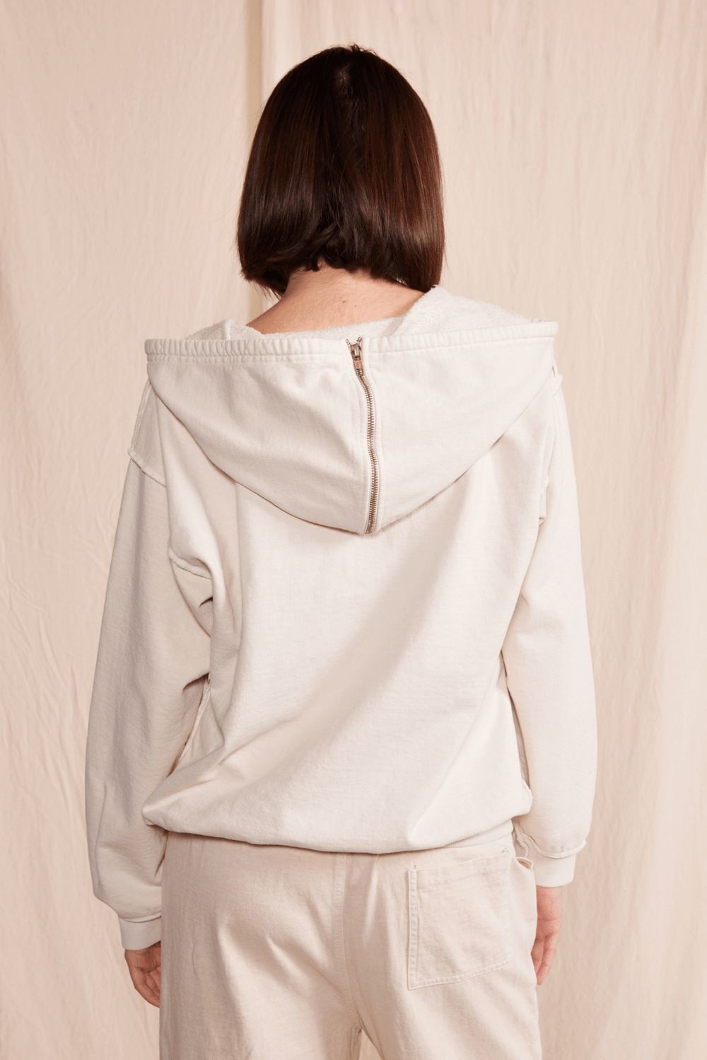 Stay cozy in our Midnight Hoodie, made with 100% heavy cotton for ultimate comfort. With a zip-up design and ribbed cuffs and waist, this relaxed fit hoodie is perfect for any adventure. 