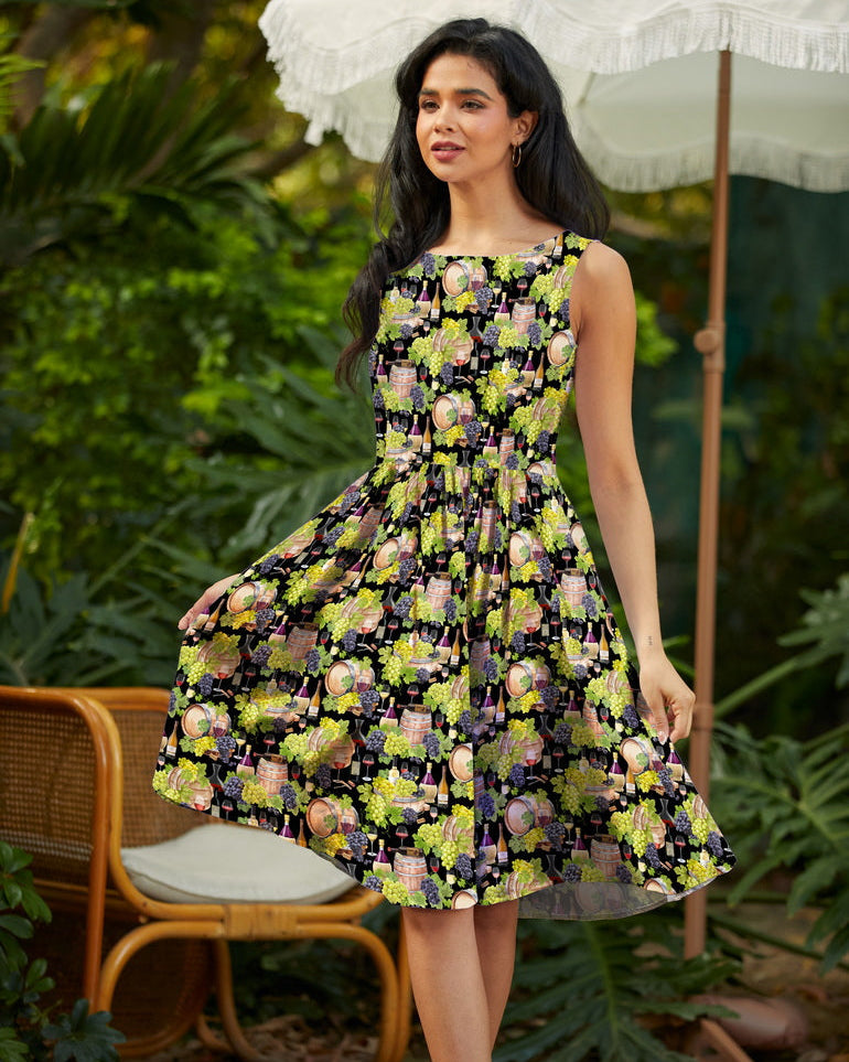 Made in USA. Shop the Wine Vintage Dress by Retrolicious in 100% cotton, with a high neckline, longer full skirt and hidden pockets. Sizes XS–4X.