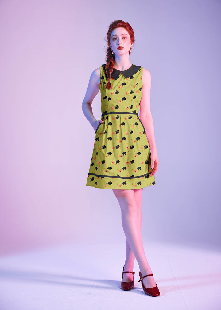 Made in USA. Shop the Black Cat Collared Dress by Retrolicious in 100% cotton, with a Peter Pan collar, contrast piping, A-line skirt and pockets.