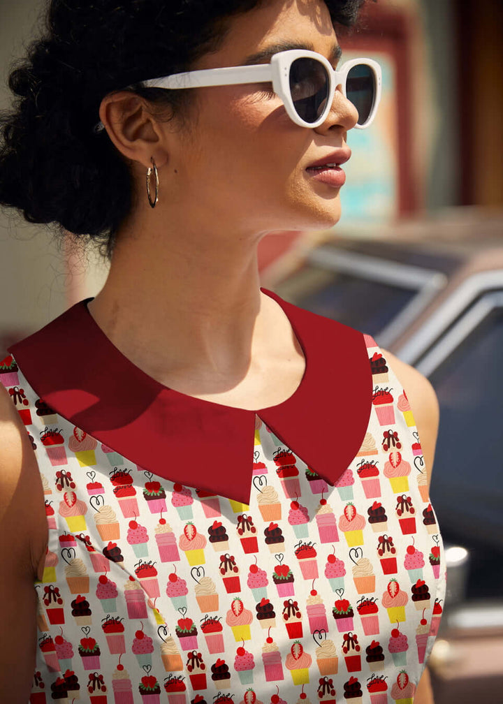 Made in USA. Shop the Retrolicious Cupcake Collared Dress in 100% cotton, with a Peter Pan collar, contrast piping, A-line skirt and pockets.