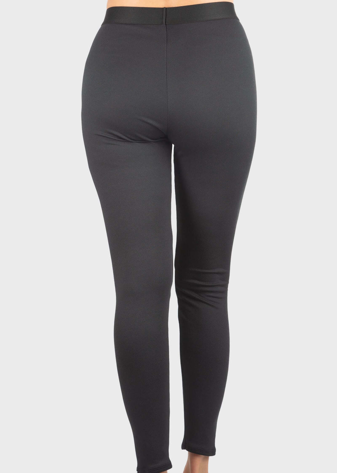 Experience unmatched warmth and comfort with the HEATR® Tundra Base Layer pant—our top-selling choice for lightweight, effective insulation. Designed without a women’s cut, this thin, flexible layer easily fits under any outfit, providing consistent heat from 0° to 75° F. The HEATR® technology integrated throughout the pant supports muscle recovery while keeping you dry and cozy during all your outdoor winter activities. Featuring an exposed waistband for added comfort, these base layer pants are ideal for 