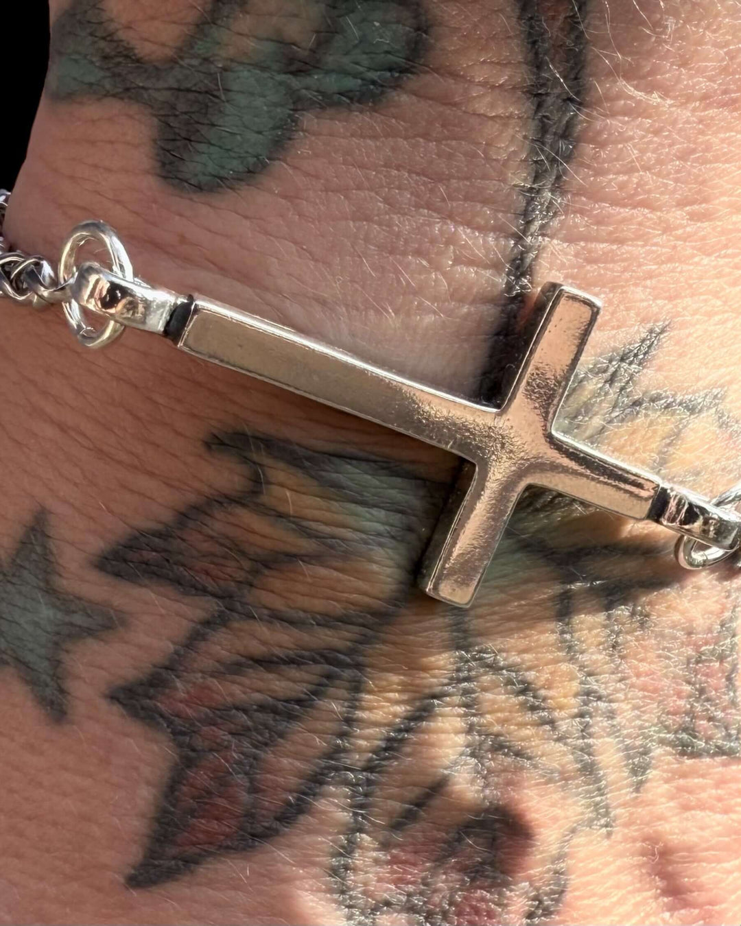 Handcrafted solid sterling silver cross bracelet on a 4mm or 8mm stainless steel wheat chain. Unisex. Made in USA with a lifetime warranty