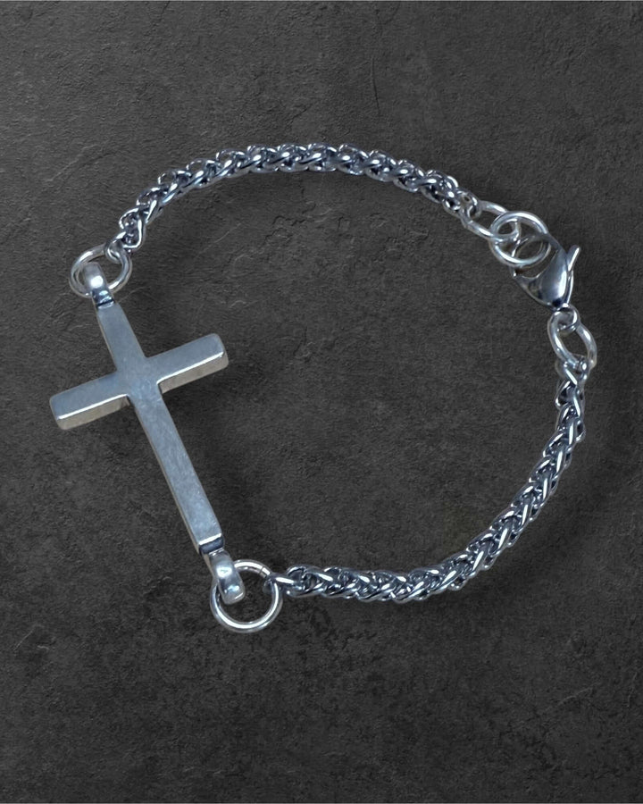 Handcrafted solid sterling silver cross bracelet on a 4mm or 8mm stainless steel wheat chain. Unisex. Made in USA with a lifetime warranty