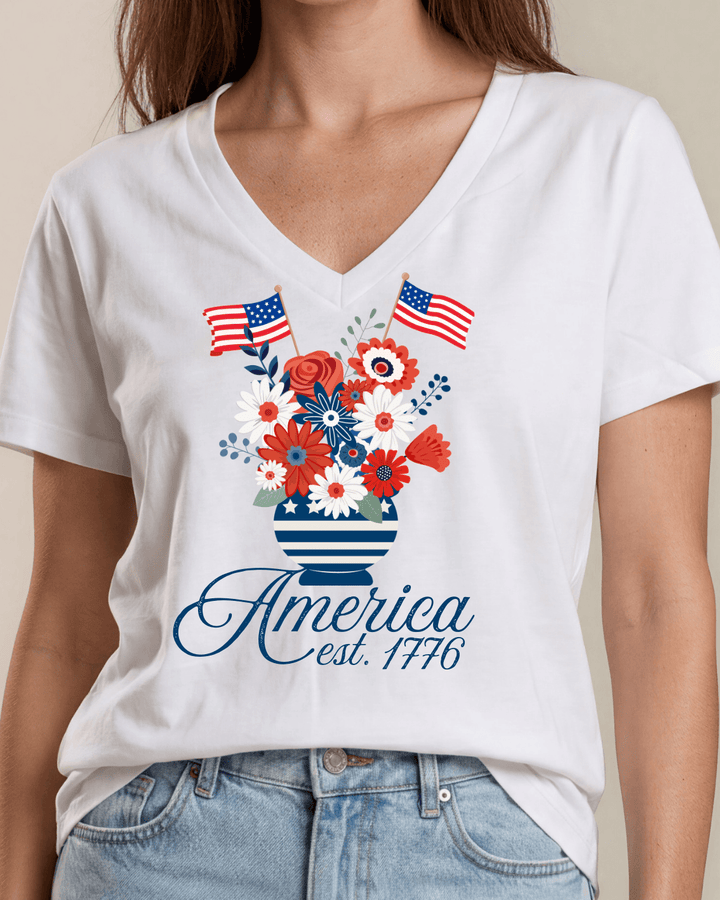 Patriotic floral bouquet graphic V-neck tee with America est. 1776 script. 100% cotton, USA-milled fabric, made in USA. Perfect for 4th of July.