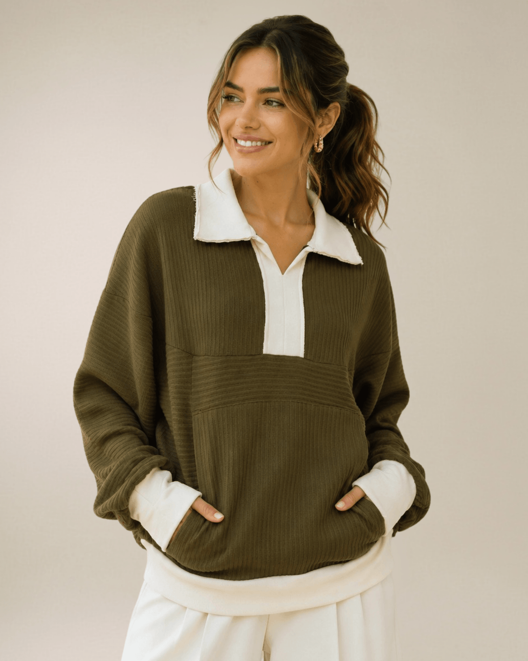 Made in USA. Women's Cabin Crew dark olive varsity pullover with contrast collar, kangaroo pocket & cozy textured fabric. Relaxed fit. Sizes S-L.