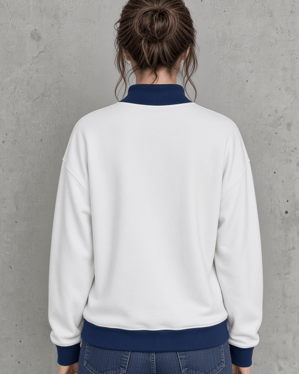 Made in USA. Layer up for fall in a women's white oversized French terry sweatshirt with navy trim and a red, white and blue USA 1776 graphic. Be Patriotic Year Round.