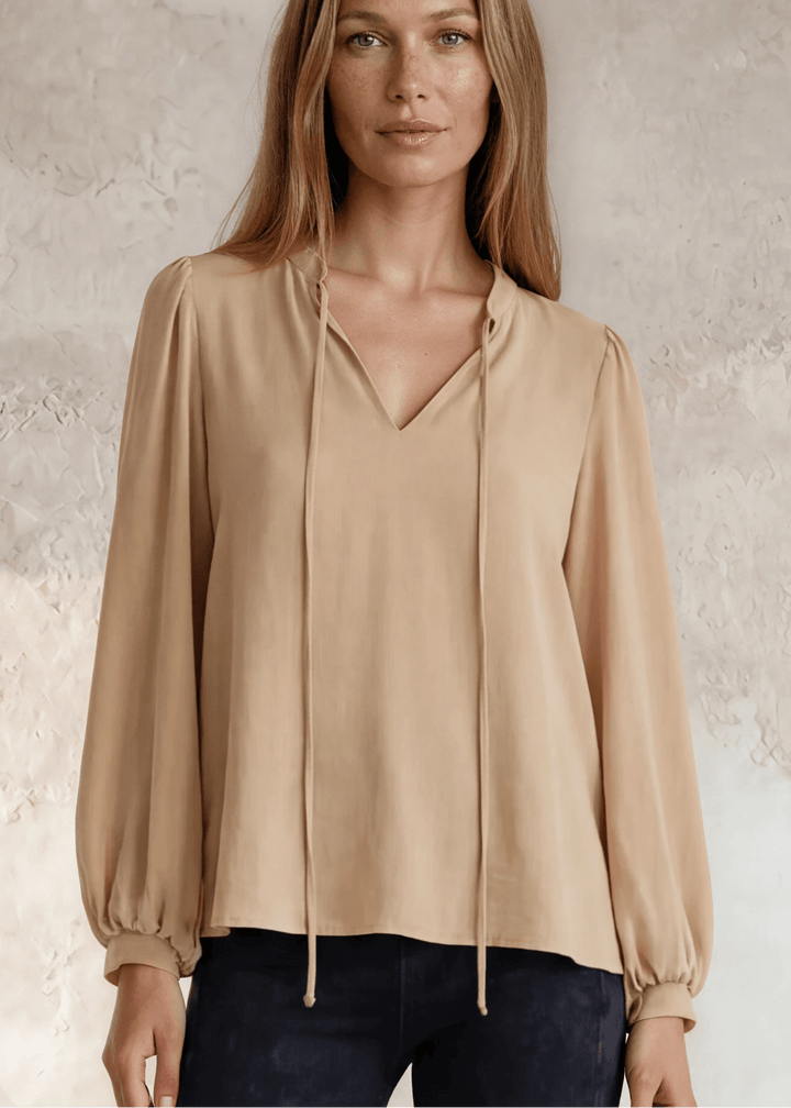 Champagne Matte Crepe Peasant Top | Made in USA, Romantic yet refined, this champagne matte crepe peasant top features bubble sleeves, a V-neckline, and front tie. Made in USA. Shop S–L.