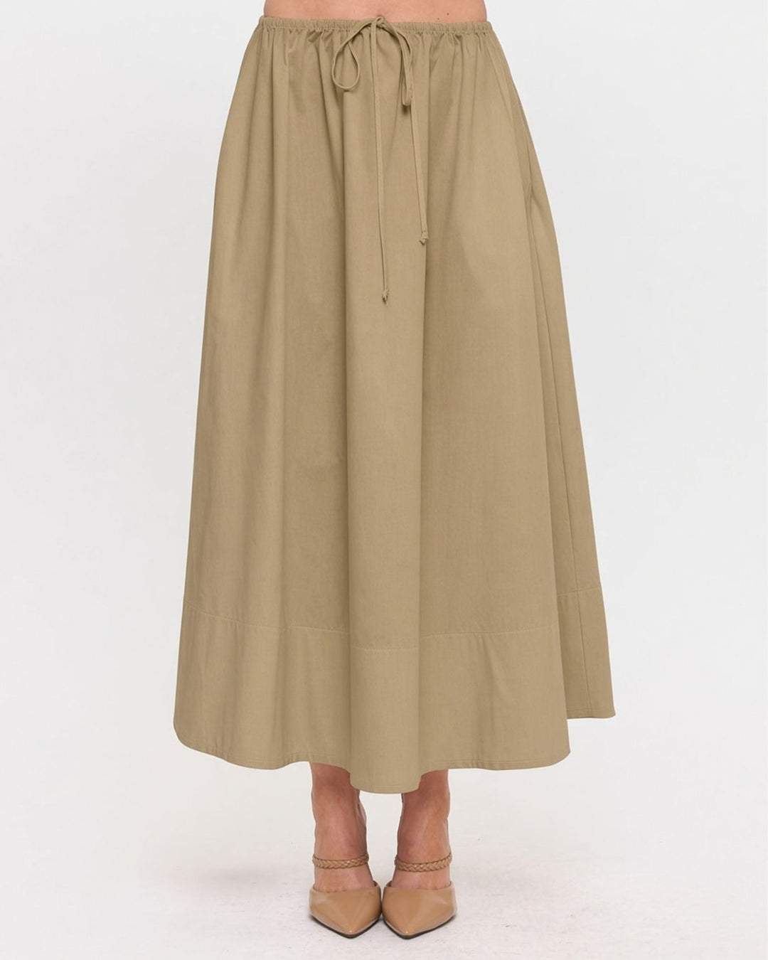 Made in USA. Discover a khaki 100% cotton poplin maxi skirt with a gathered drawstring waist and graceful, flowy silhouette. Sizes S–L.
