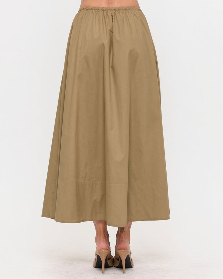 Made in USA. Discover a khaki 100% cotton poplin maxi skirt with a gathered drawstring waist and graceful, flowy silhouette. Sizes S–L.