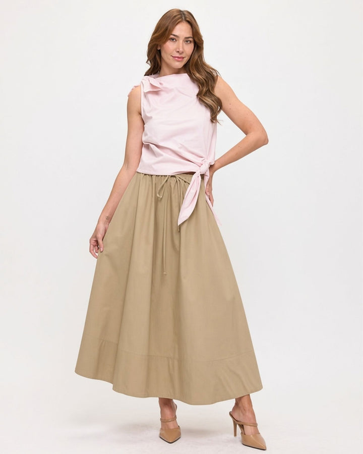 Made in USA. Discover a khaki 100% cotton poplin maxi skirt with a gathered drawstring waist and graceful, flowy silhouette. Sizes S–L.