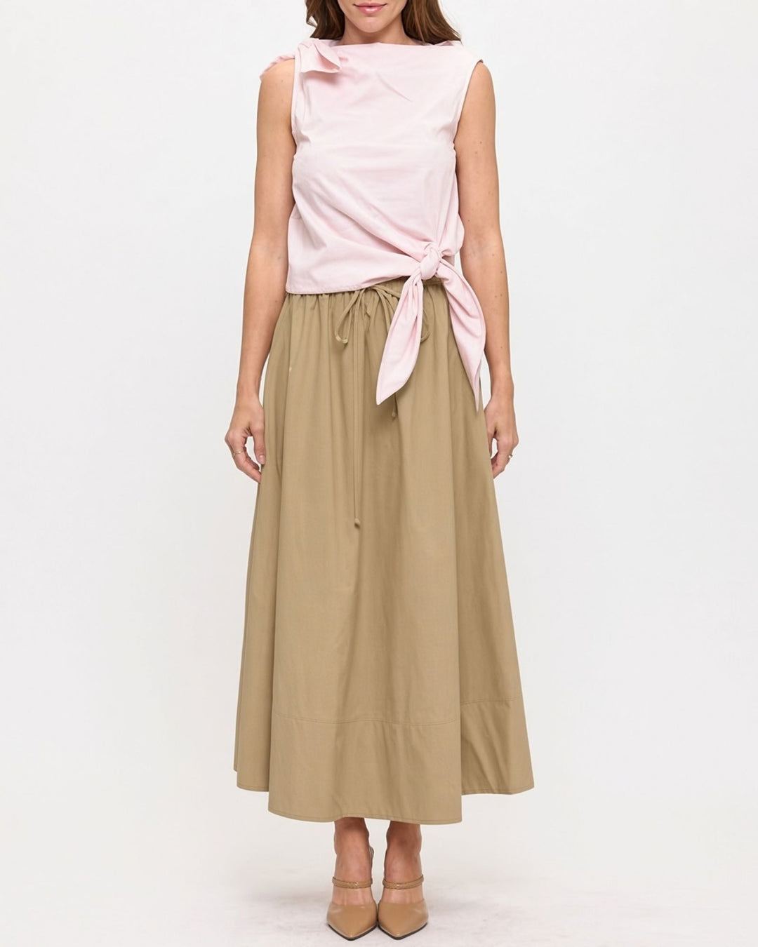 Made in USA. Discover a khaki 100% cotton poplin maxi skirt with a gathered drawstring waist and graceful, flowy silhouette. Sizes S–L.