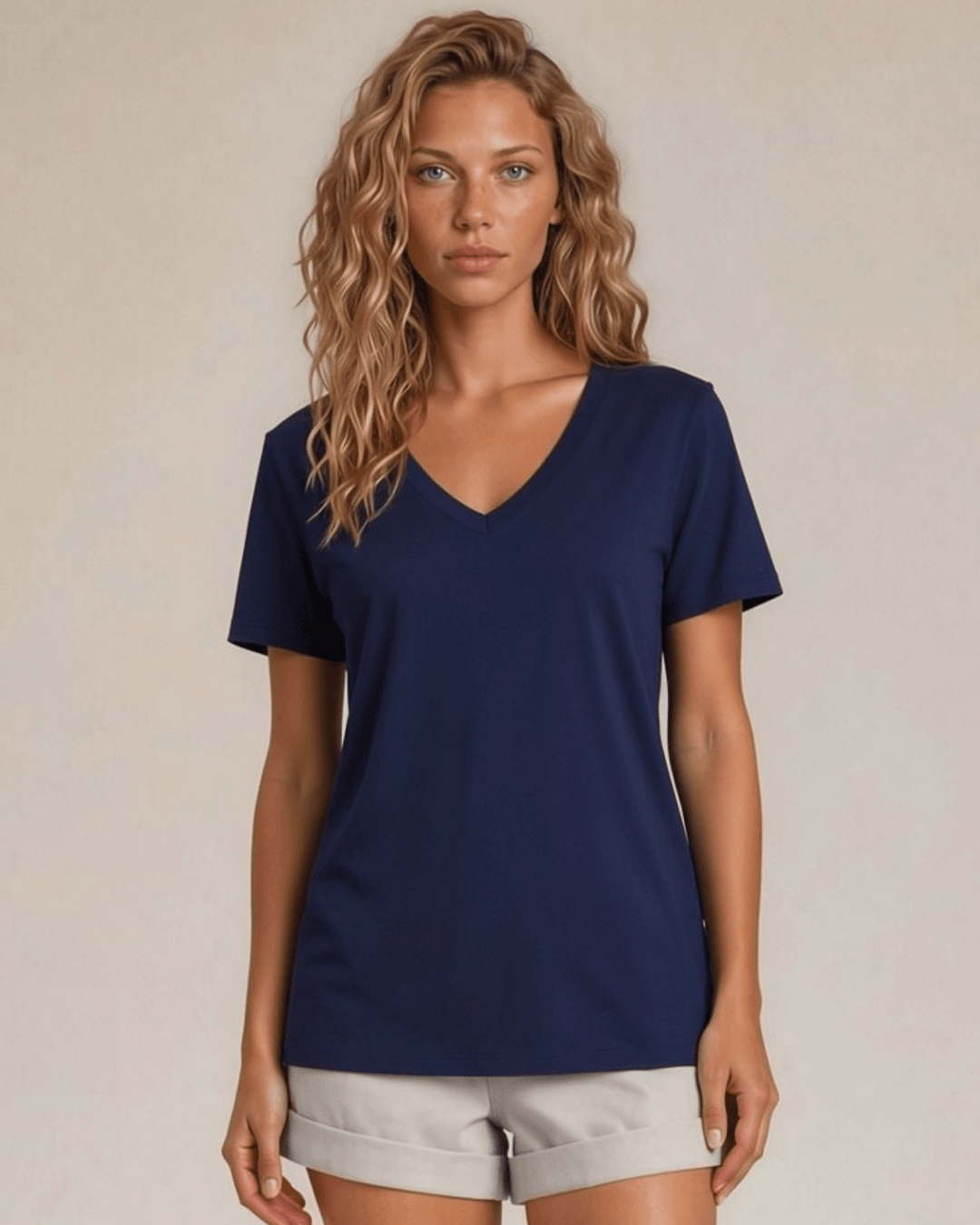 The True American Women's T-Shirt: Super soft 100% combed ring-spun cotton V-neck tee in navy, made in the USA with USA-milled fabric. Flattering fit, effortless style.