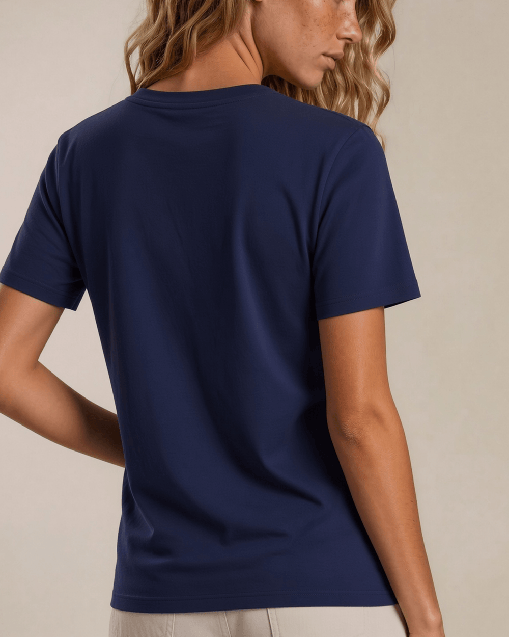 The True American Women's T-Shirt: Super soft 100% combed ring-spun cotton V-neck tee in navy, made in the USA with USA-milled fabric. Flattering fit, effortless style.