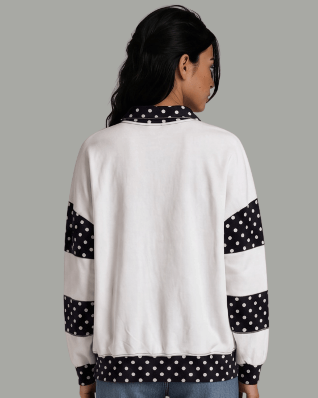 Made in USA White French terry pullover with black polka dot contrast collar, sleeves &amp; hem. Open V-neck, relaxed fit. 95% cotton. Made in USA. Sizes S–L