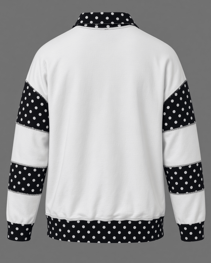 Made in USA White French terry pullover with black polka dot contrast collar, sleeves &amp; hem. Open V-neck, relaxed fit. 95% cotton. Made in USA. Sizes S–L