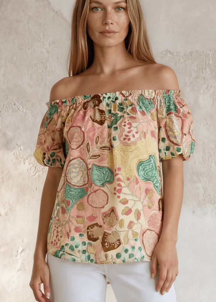 Shop the Avery Floral Off-Shoulder Puff Sleeve Top — lightweight cotton-rayon blend, pastel floral print, relaxed fit. Made in USA.