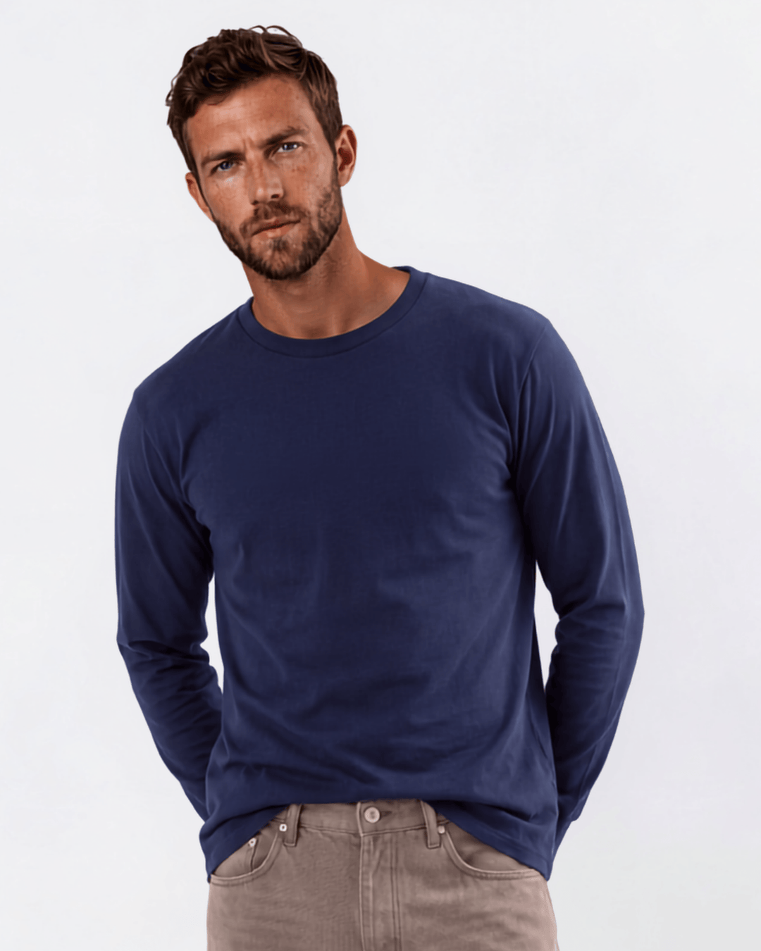 Men's long sleeve crew neck tee made in USA with 100% pre-shrunk cotton. Available in Black, White & Navy. Medium weight, ribbed cuff.