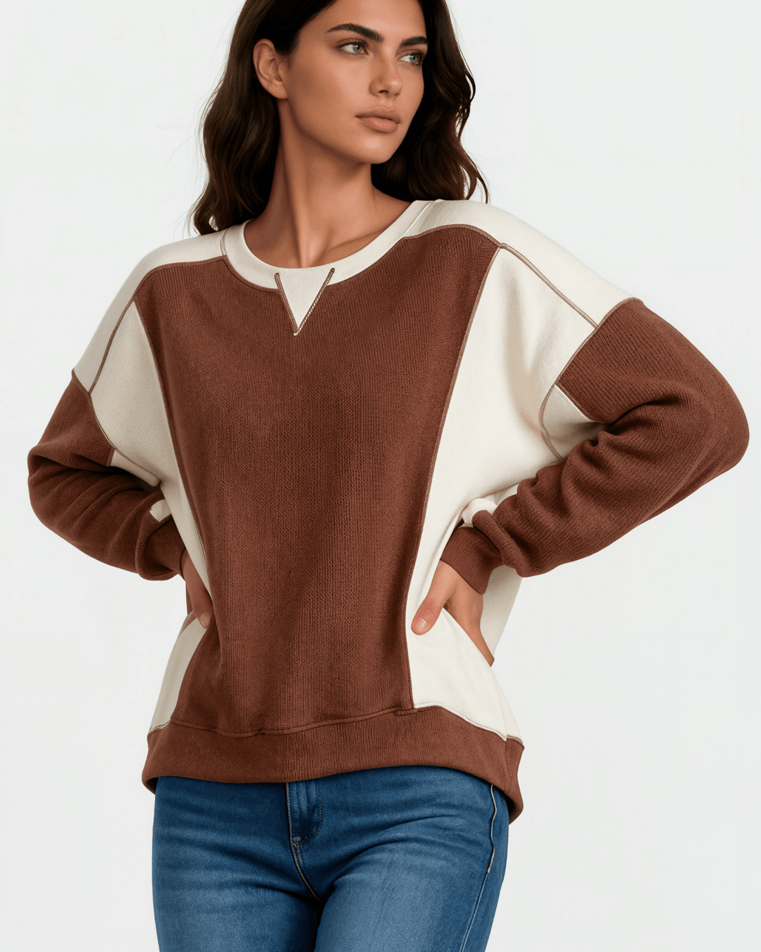 Made in USA. Nutmeg & cream color block ribbed knit sweatshirt. Notched neck, exposed seams, oversized fit. 97% polyester. Sizes S–XL.