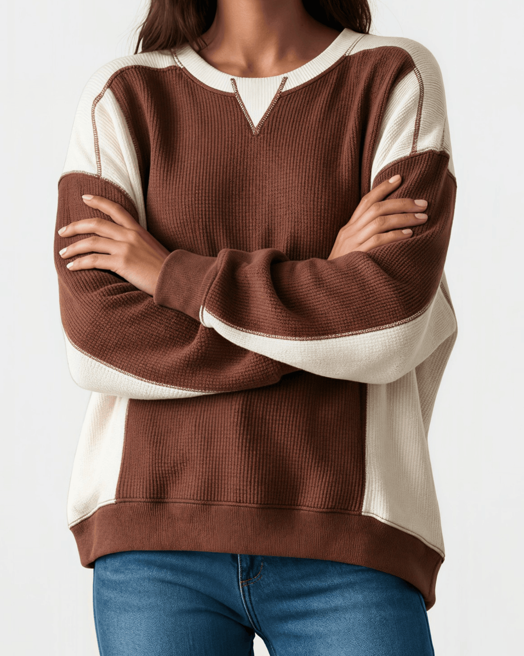 Made in USA. Nutmeg &amp; cream color block ribbed knit sweatshirt. Notched neck, exposed seams, oversized fit. 97% polyester. Sizes S–XL.