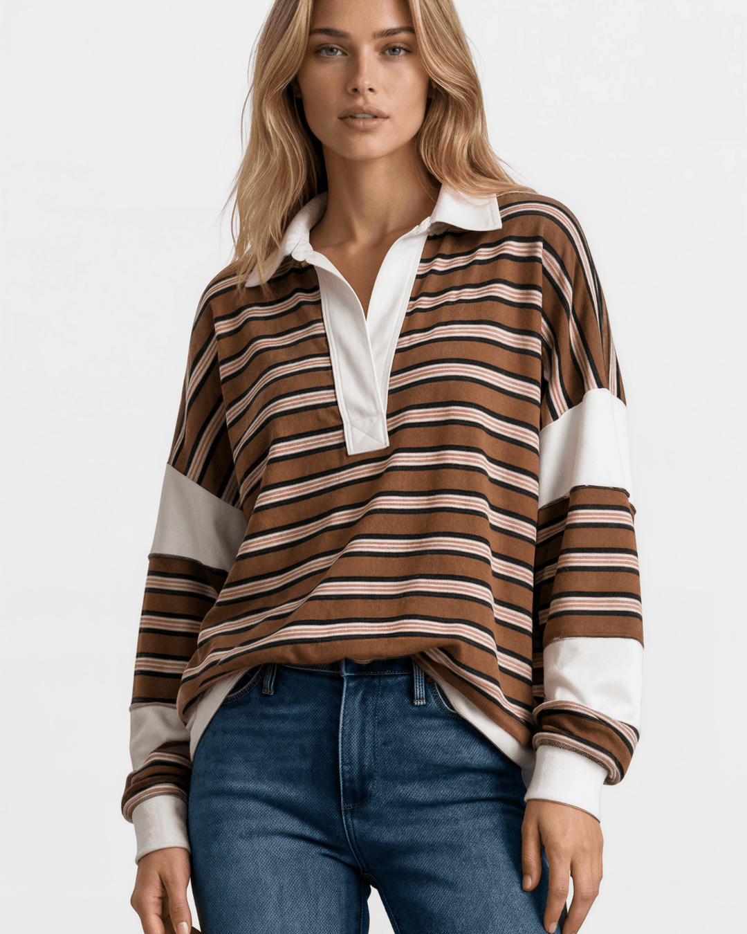 Made in USA. Women's oversized rugby stripe polo pullover in latte, black & blush. Contrast white collar, raw edge seams. 97% Polyester, 3% Spandex.