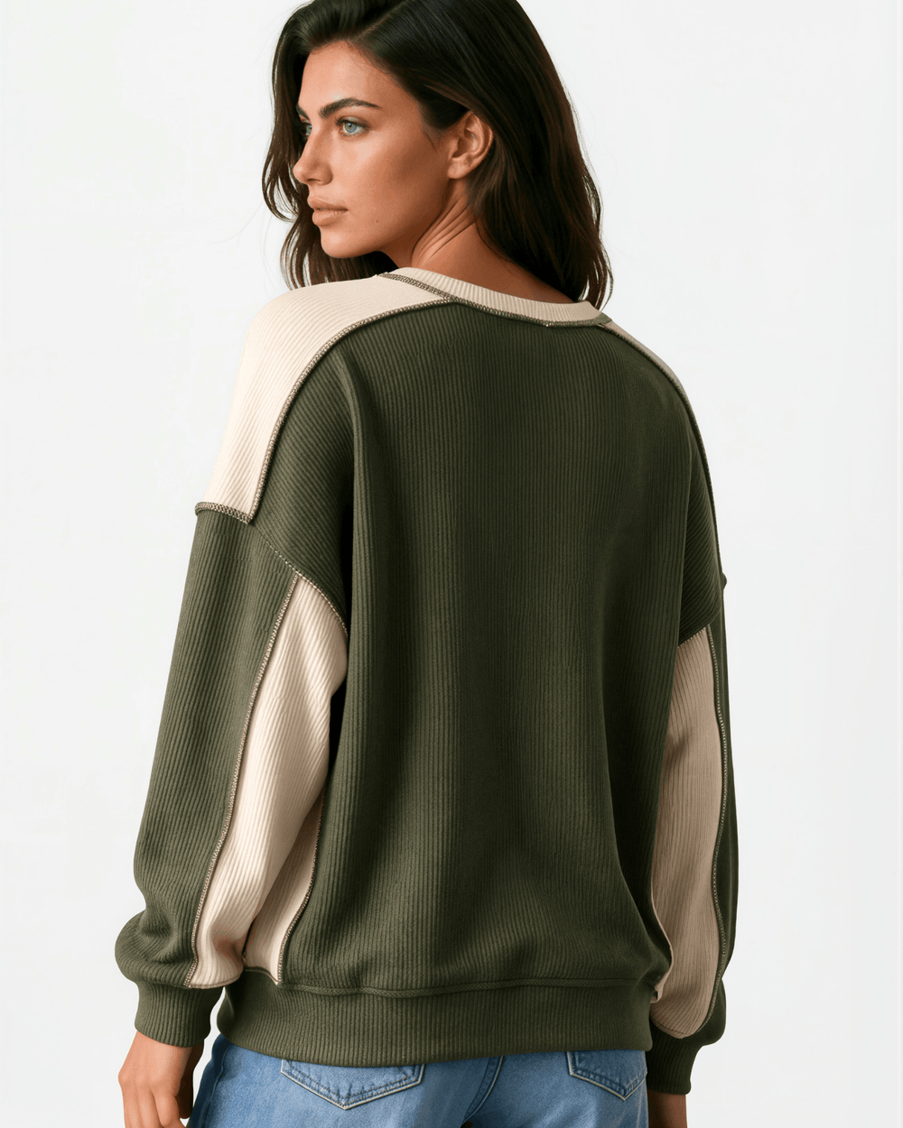 Made in USA. Olive & cream color block ribbed knit sweatshirt. Notched neck, exposed seams, oversized fit. 97% polyester. Sizes S–XL.